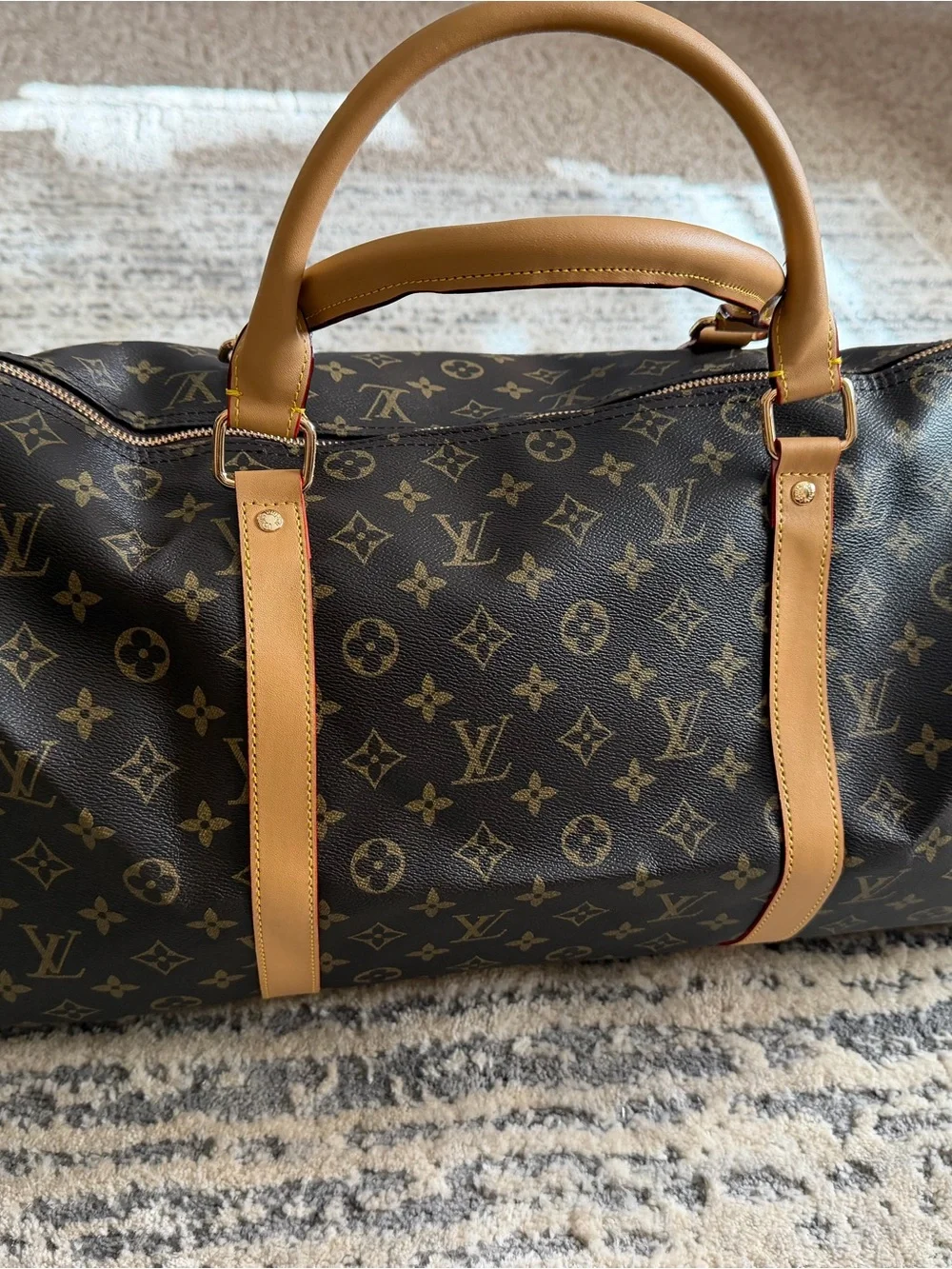Louis Vuitton Brown Monogram Handbag with Gold Trim